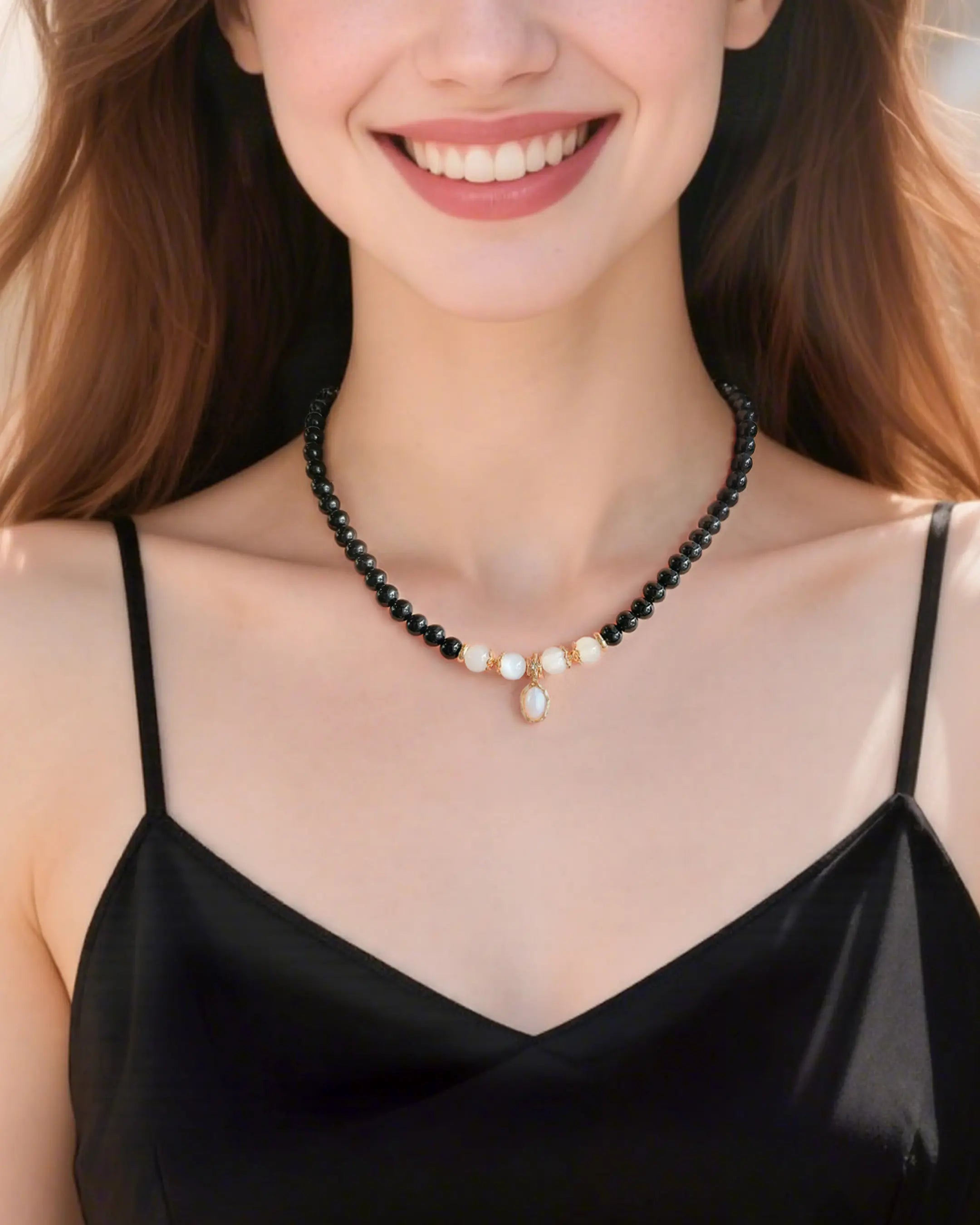 black onyx moonstone beaded necklace on the model
