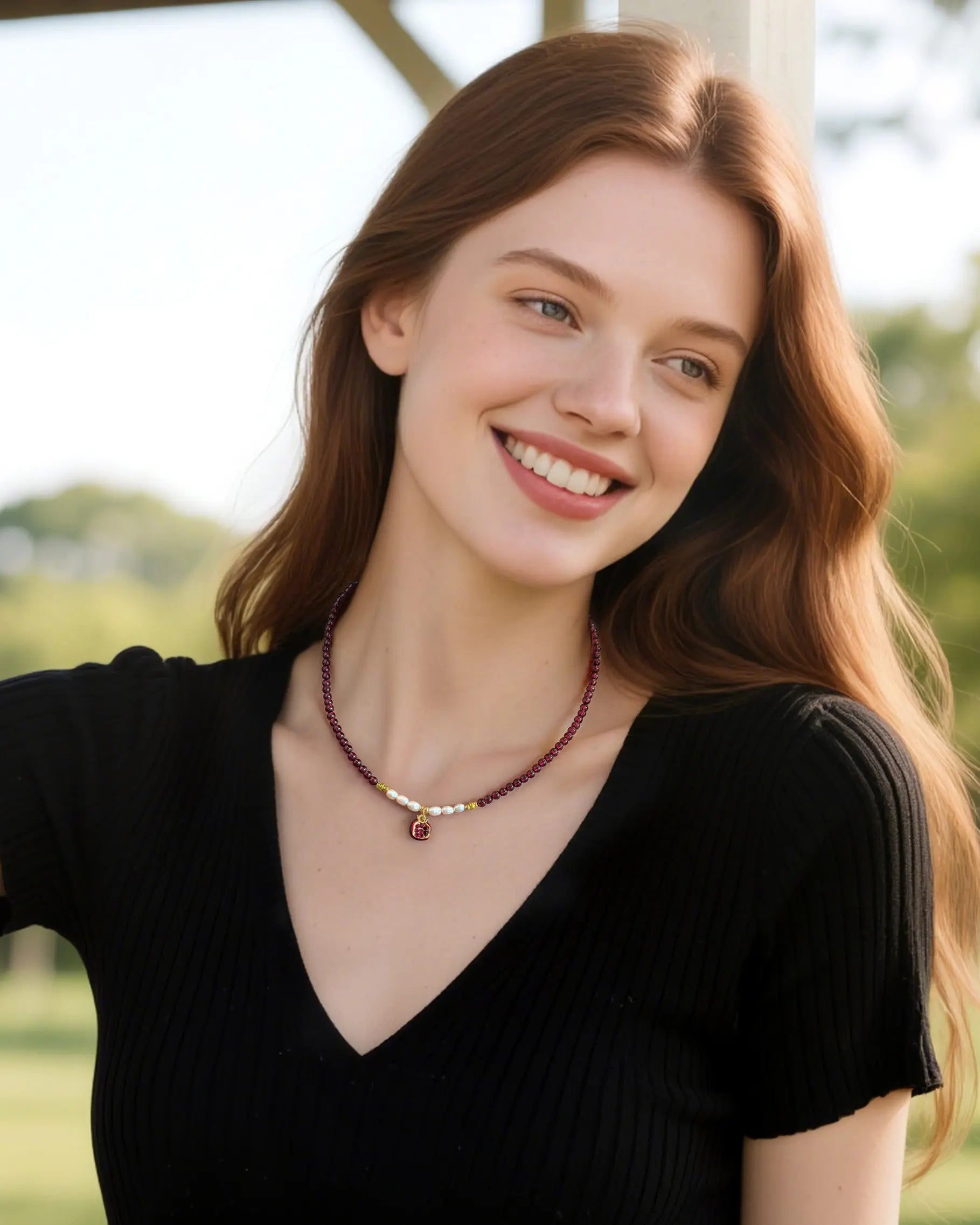 garnet and pearl beaded necklace on the model