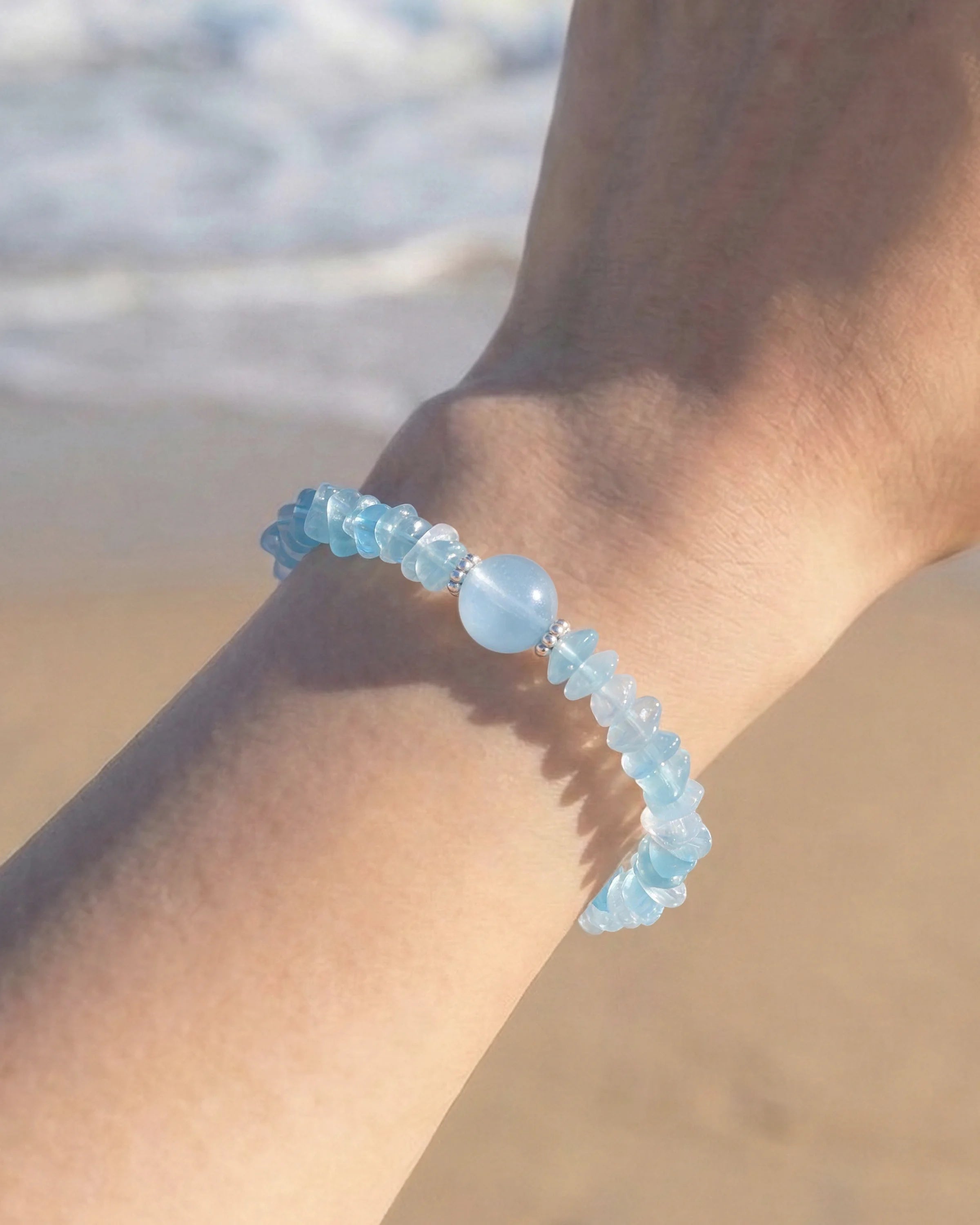 Close-up of Aquamarine Silver Freeform Chips Focal Bracelet on wrist