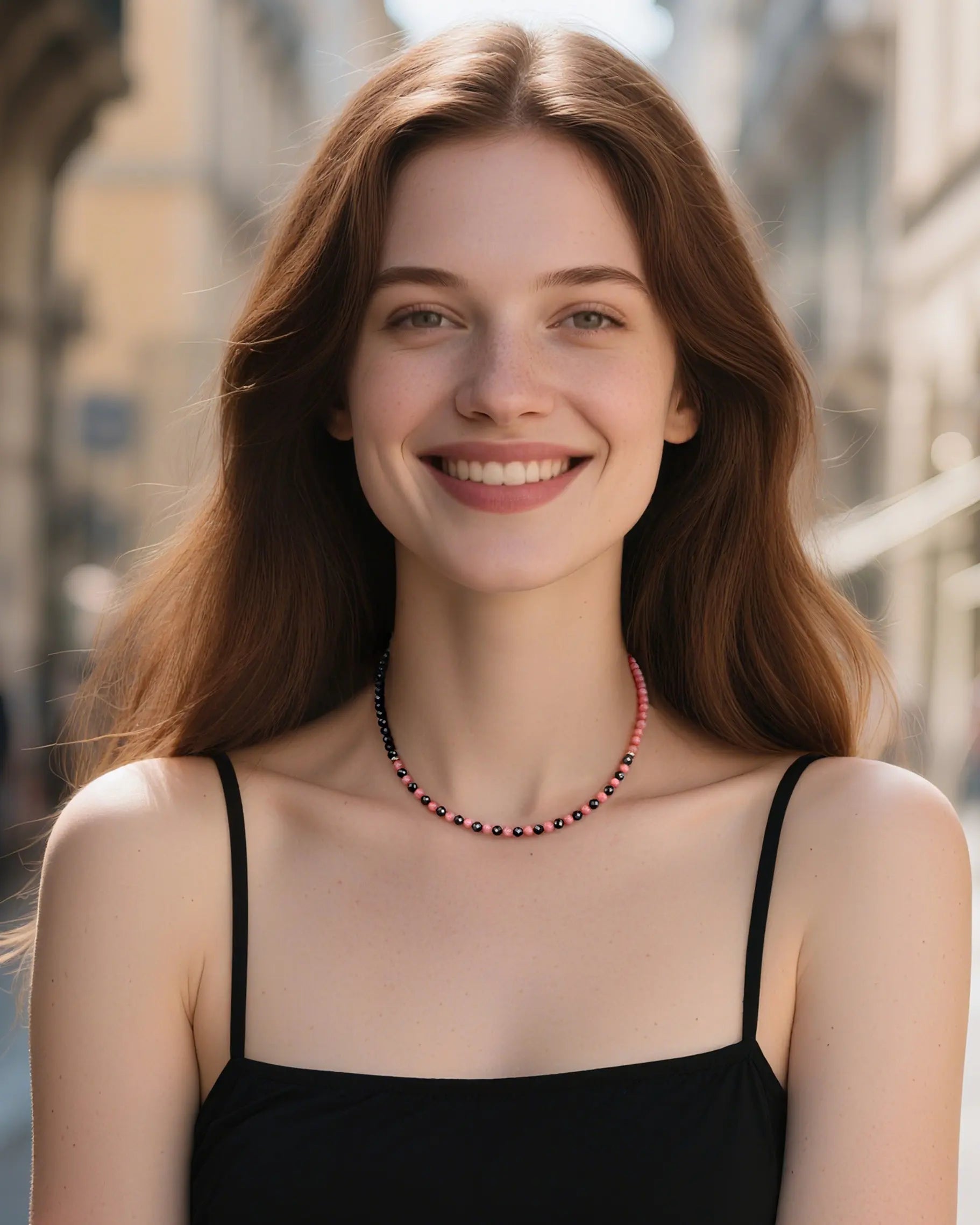 black tourmaline rhodochrosite beaded necklace on the model