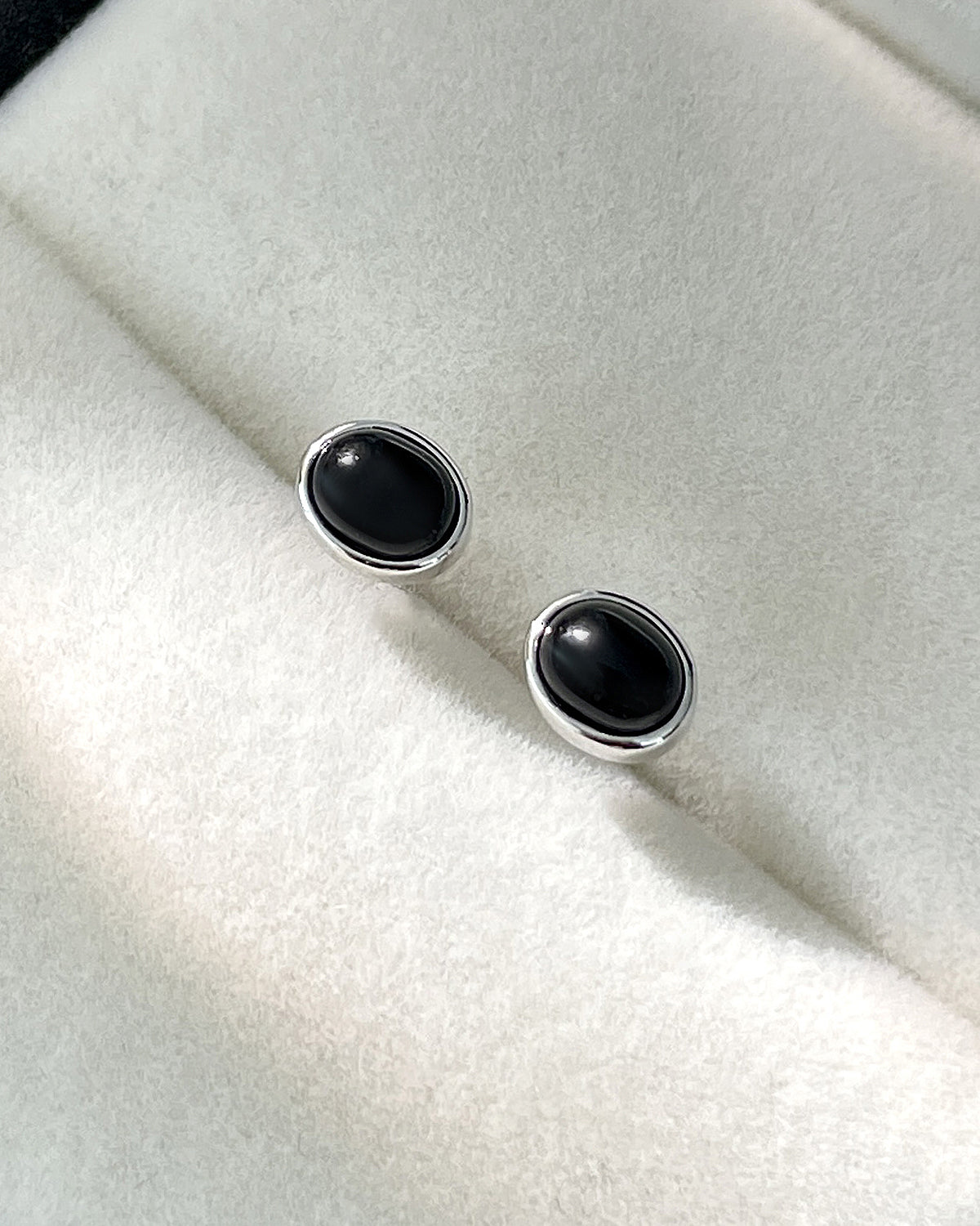 Black onyx oval stud earrings