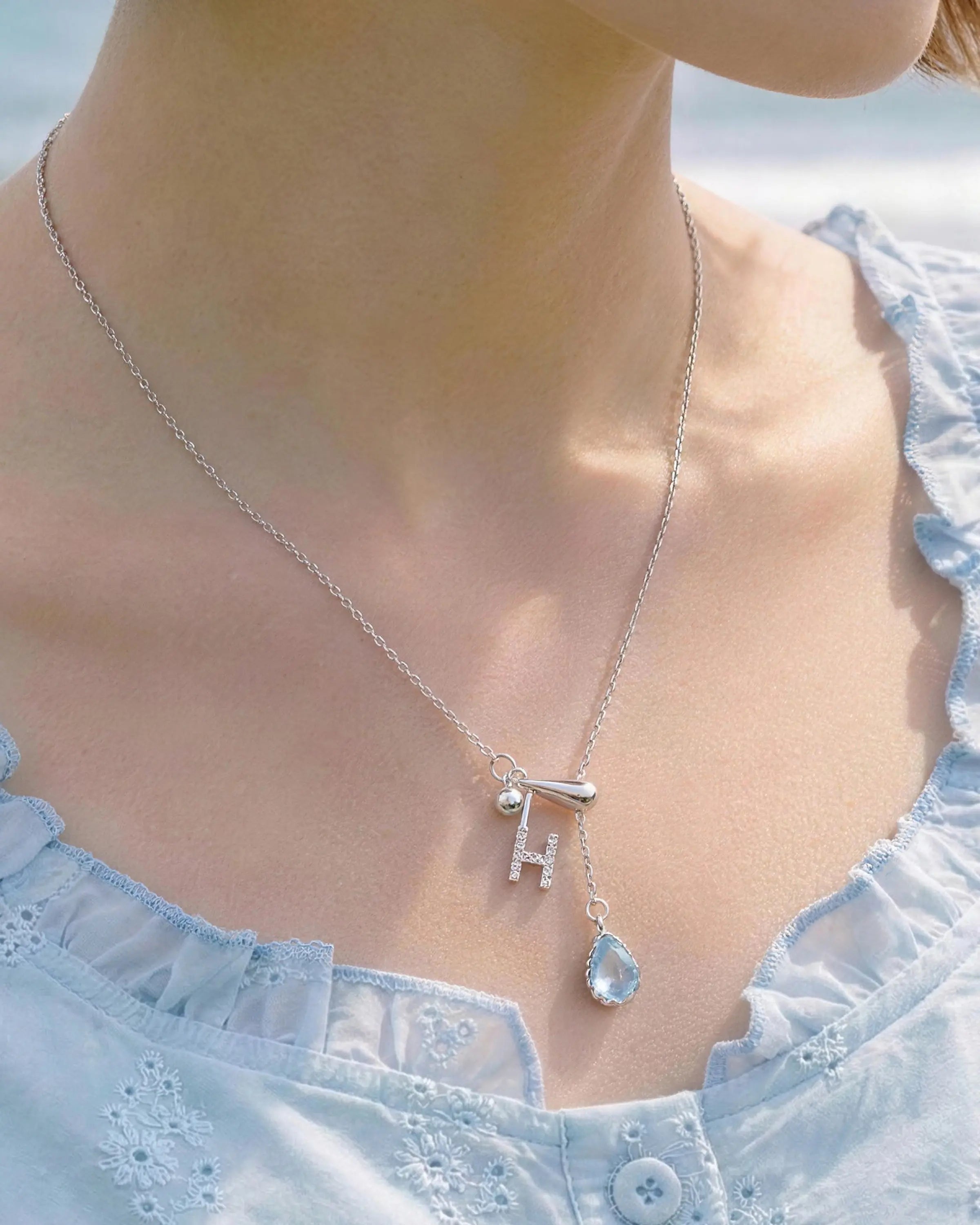 aquamarine pendant necklace on model