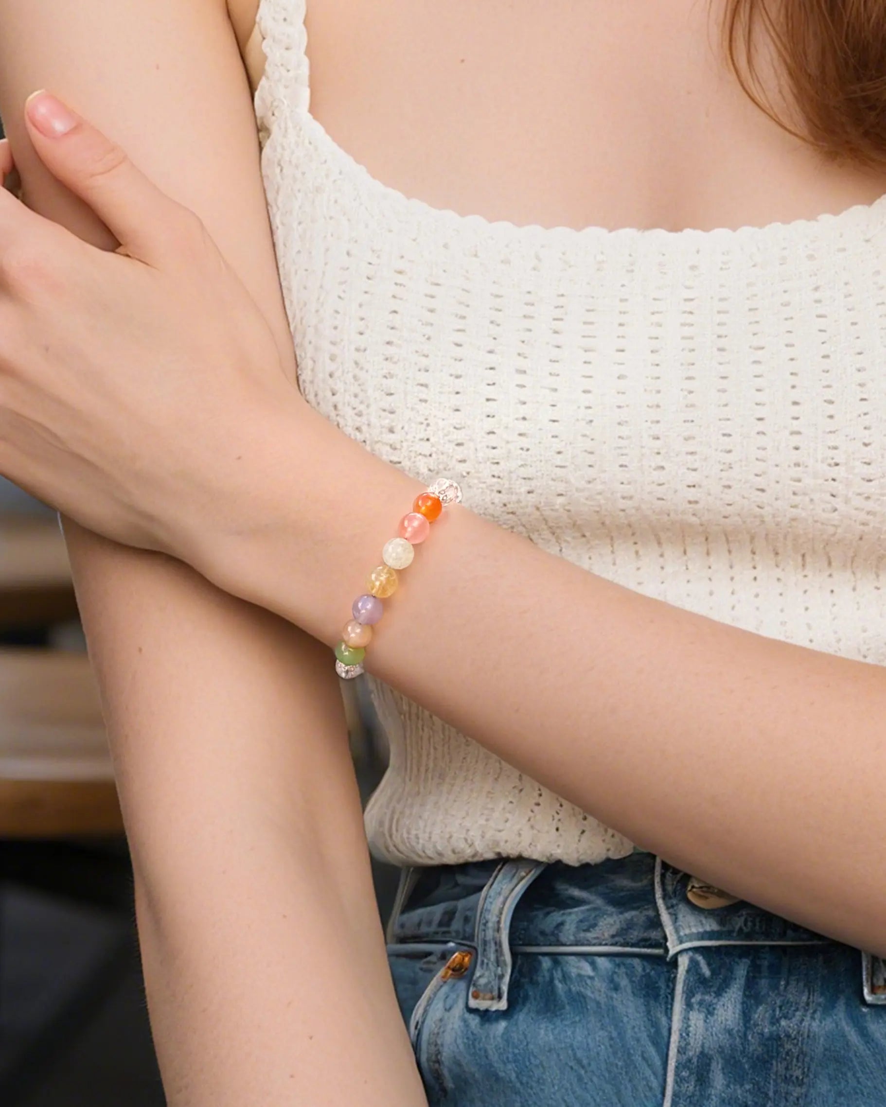 clear quartz rainbow colored beaded bracelet on the model