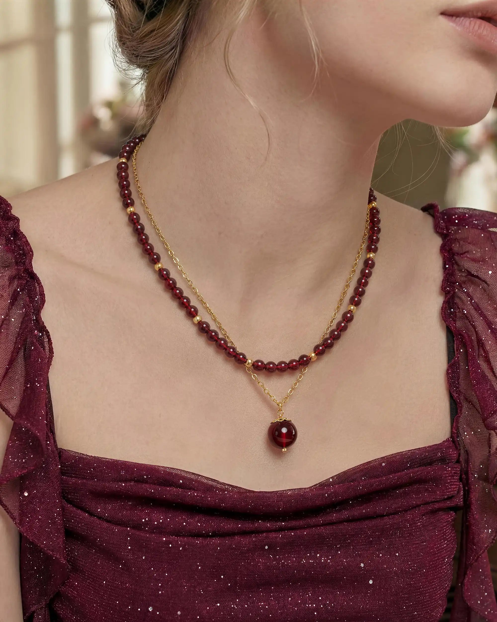 garnet pendant necklace set worn by model