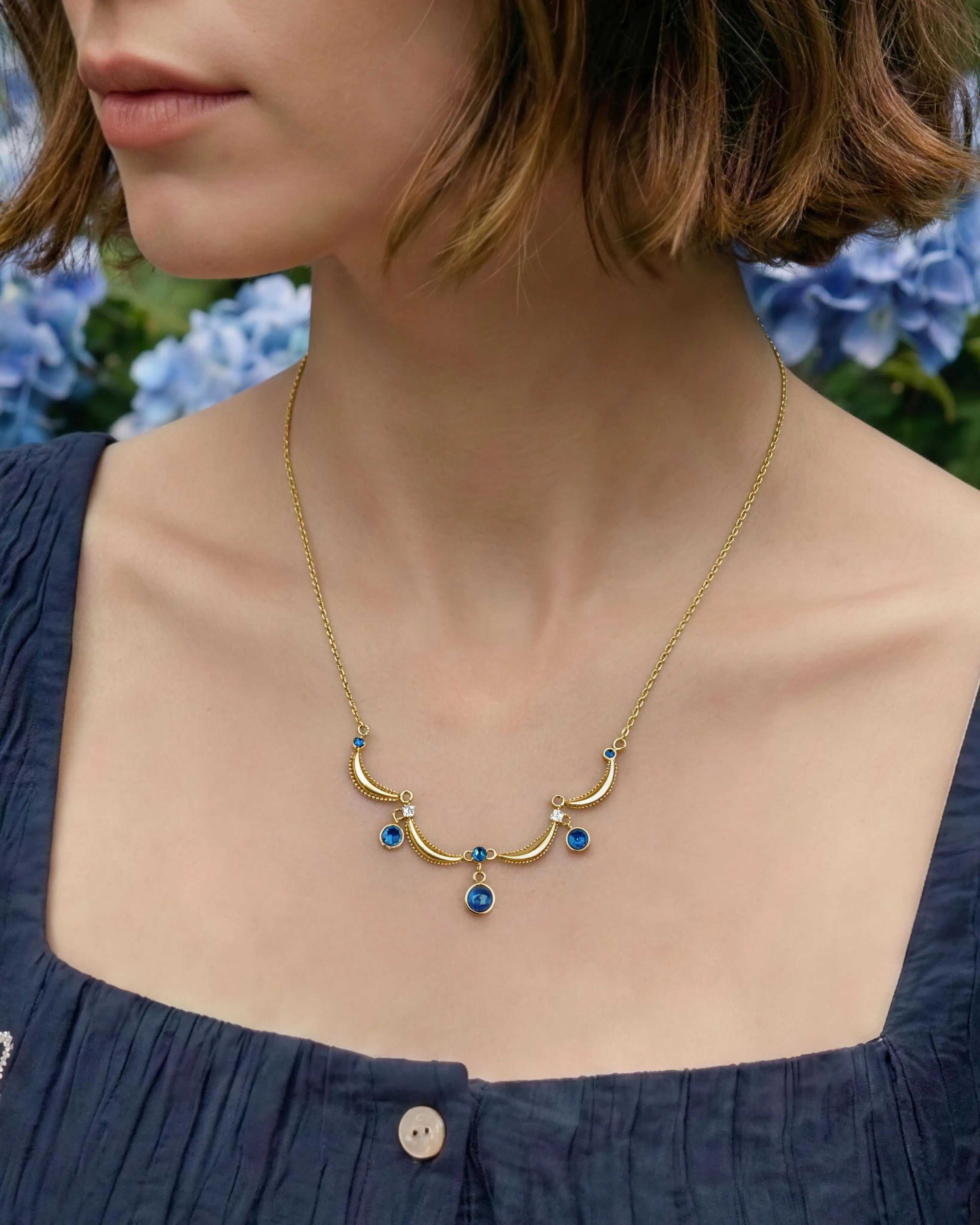 lapis lazuli charm necklace on the model