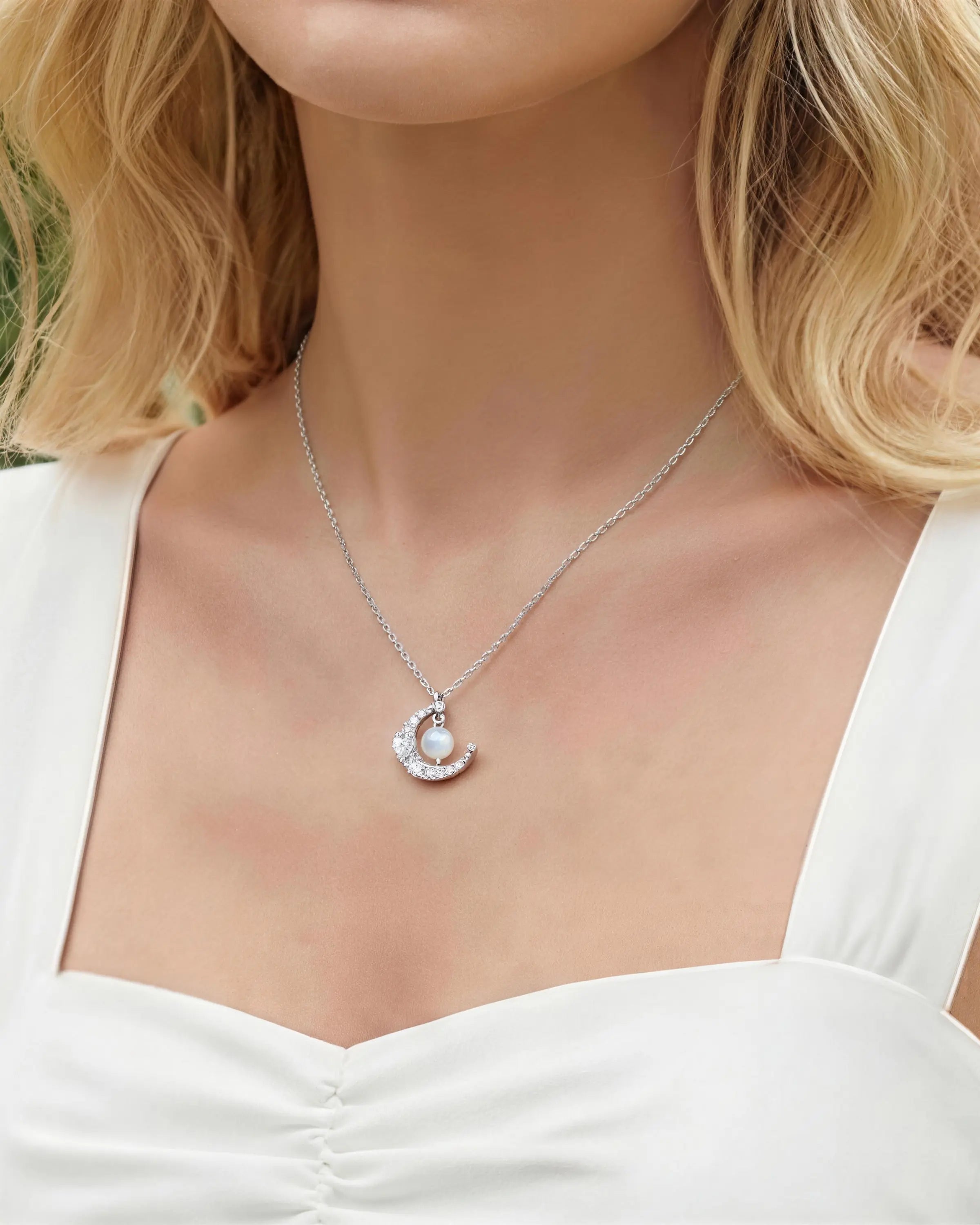moonstone crescent pendant necklace on the model