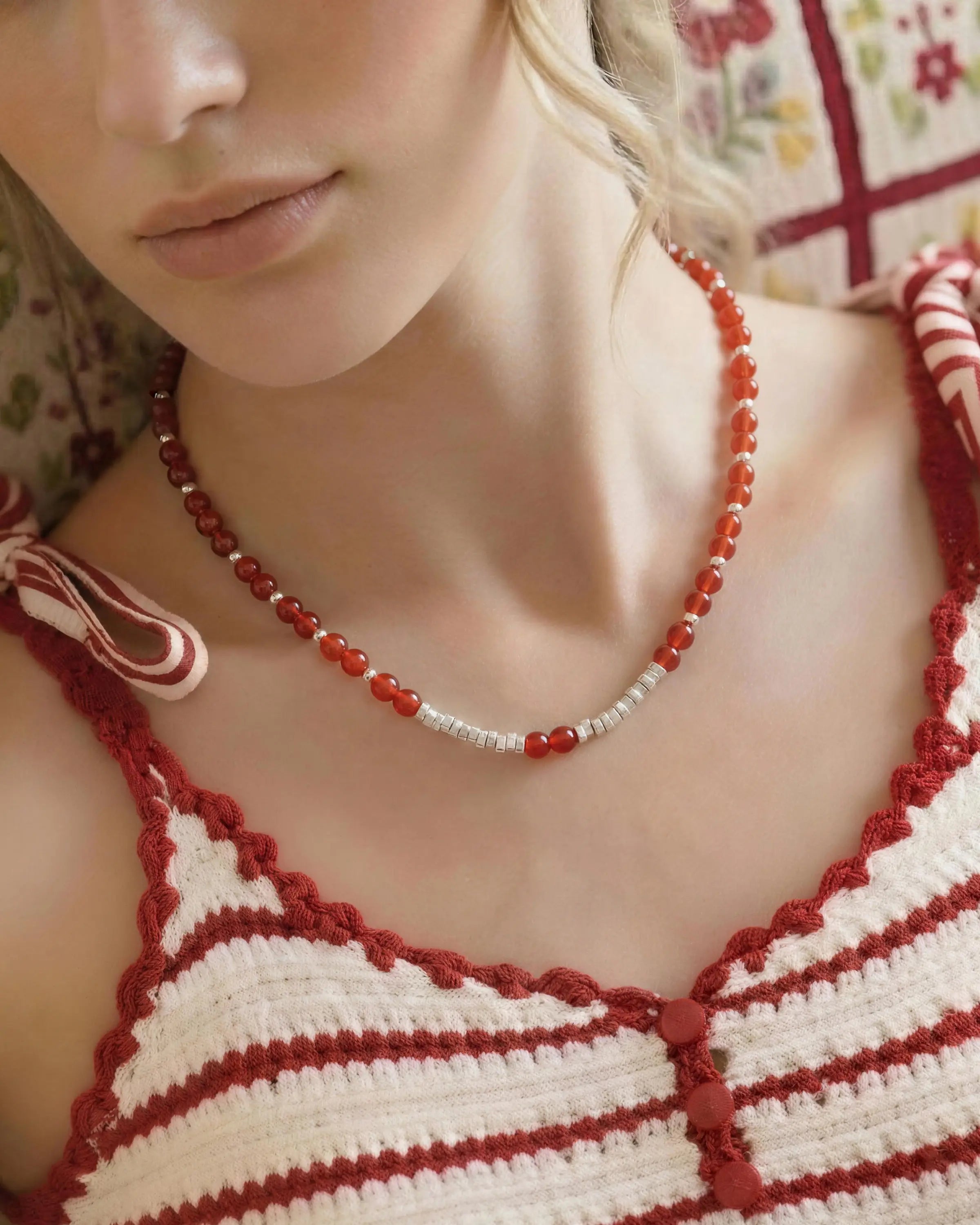 red agate beaded necklace worn by model