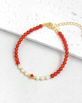 Red Agate Pearl Gold Bracelet – Courage & Wisdom
