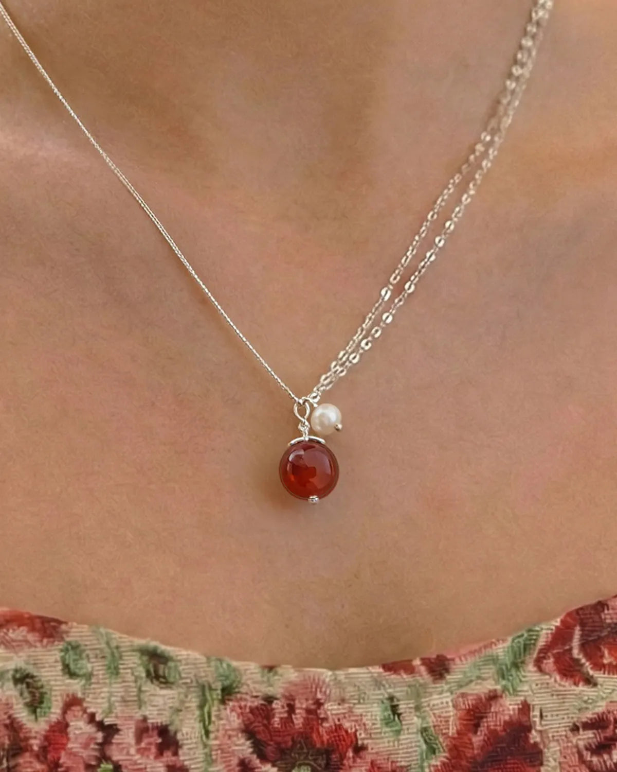 red agate pendant necklace on model