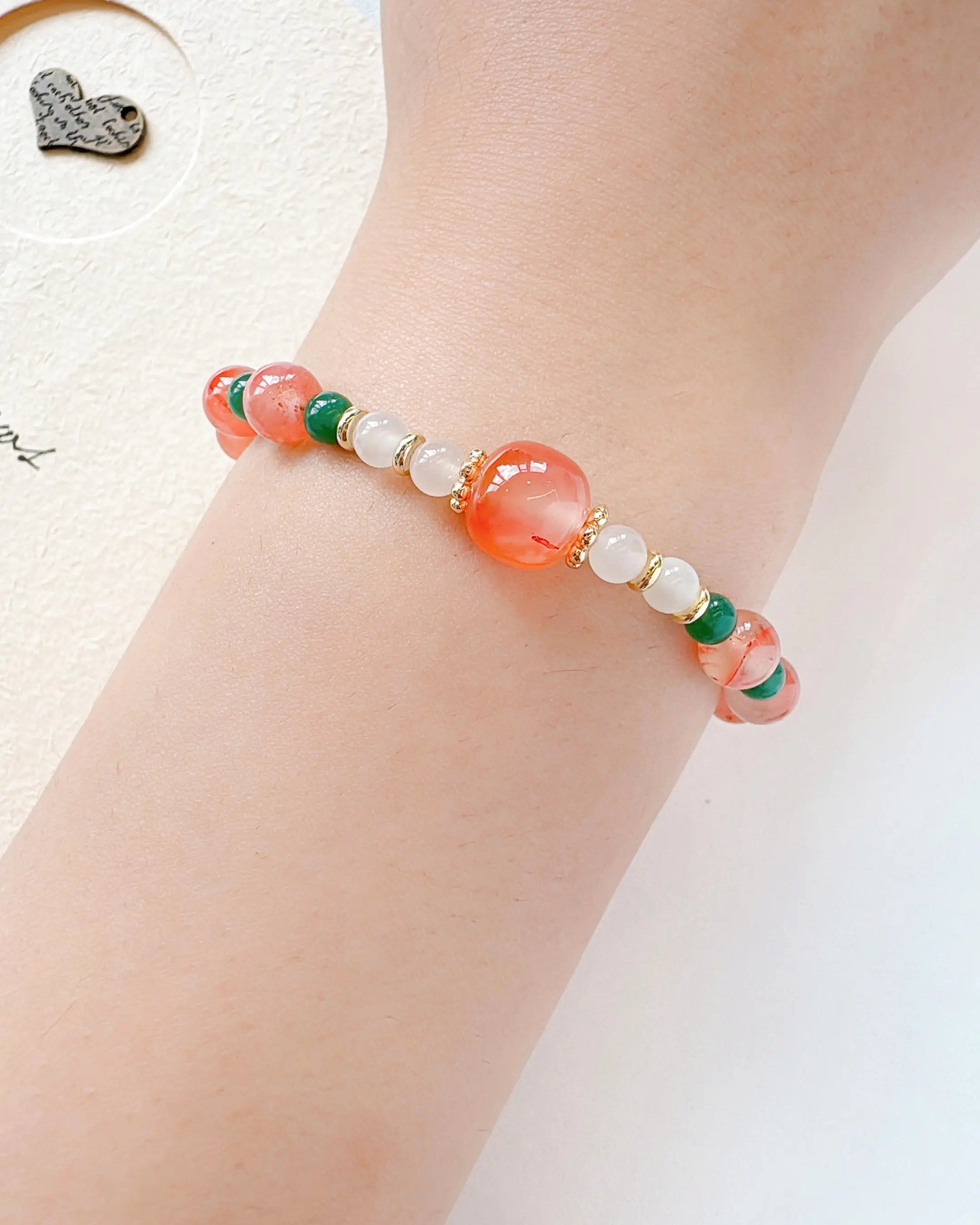 south agate and green agate beaded bracelet on the model