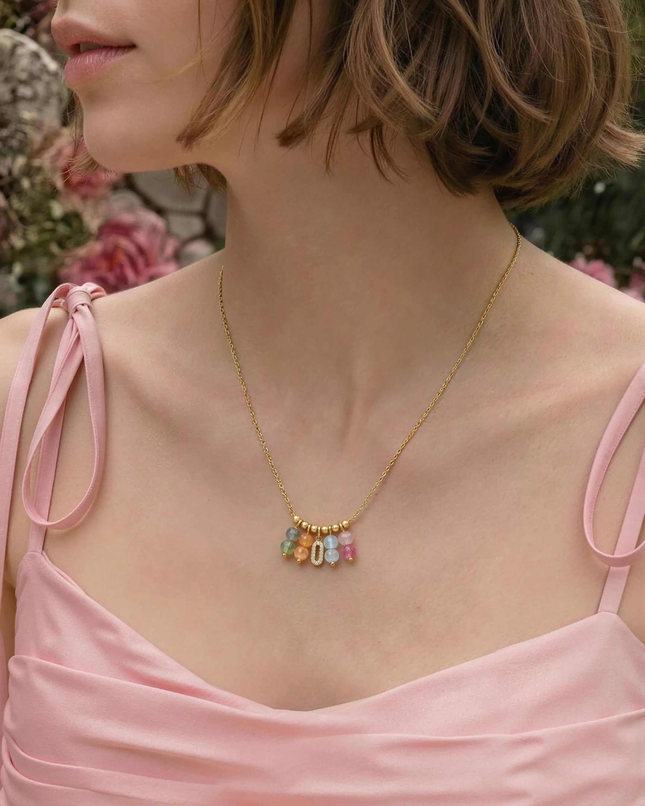 tourmaline charm necklace on the model
