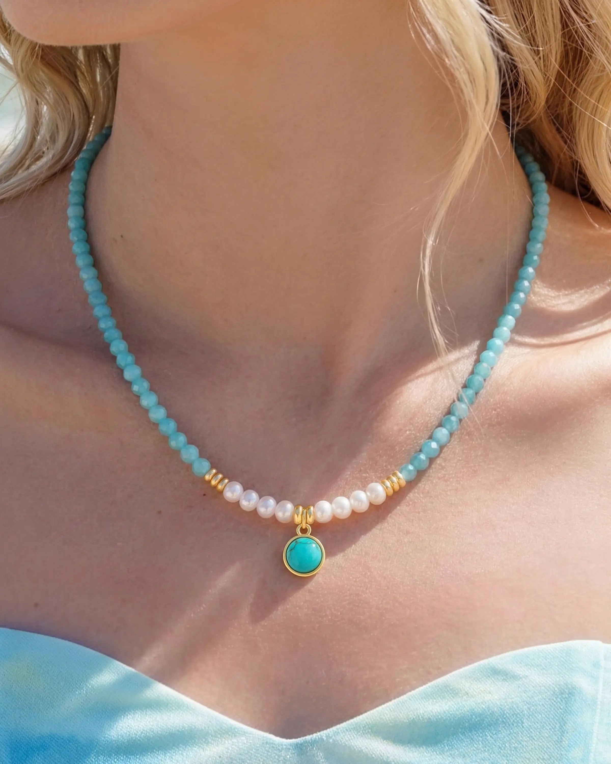 Close-up of Amazonite Turquoise Pearl Gold Beaded Necklace on neck