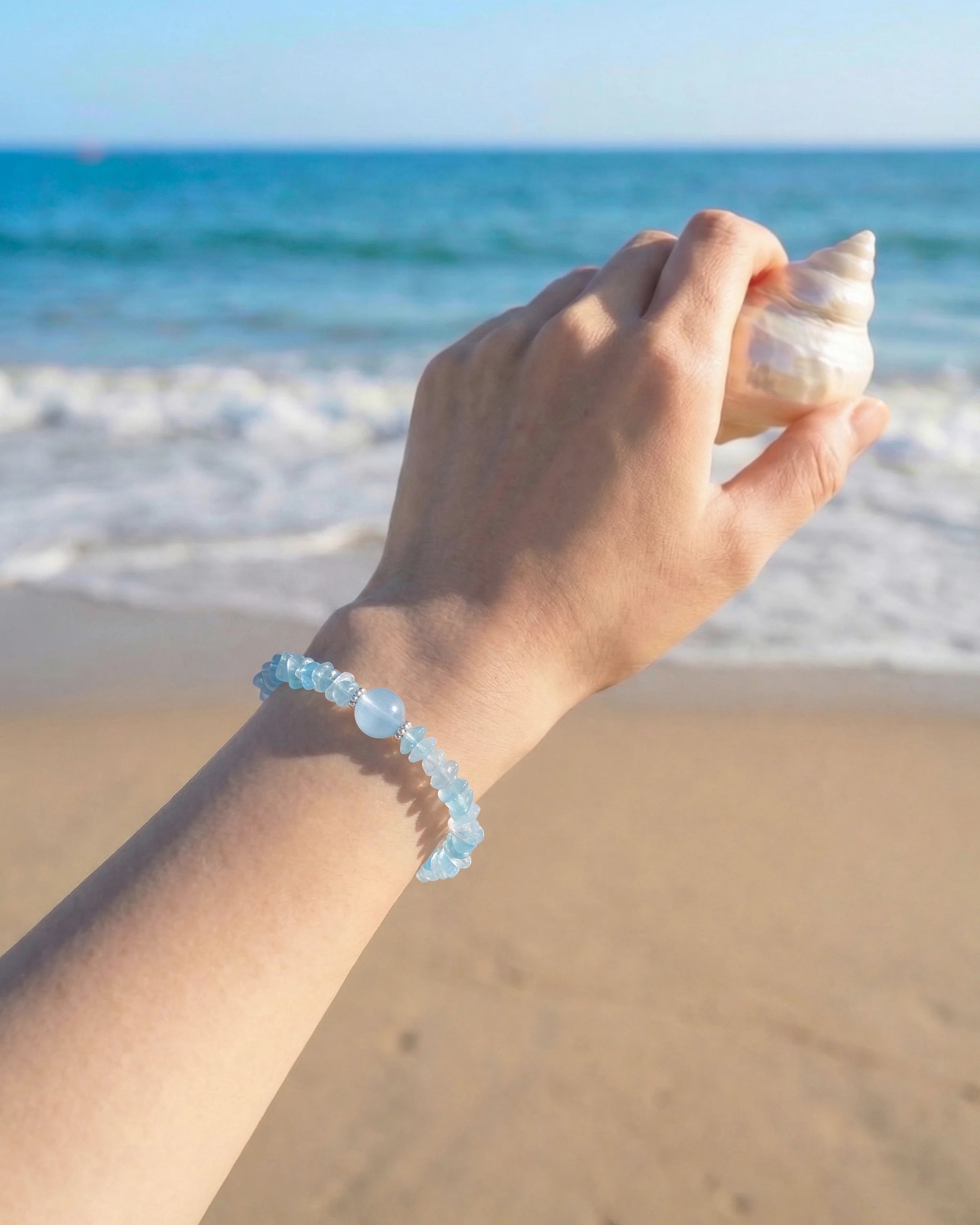 Model wearing Aquamarine Silver Freeform Chips Focal Bracelet