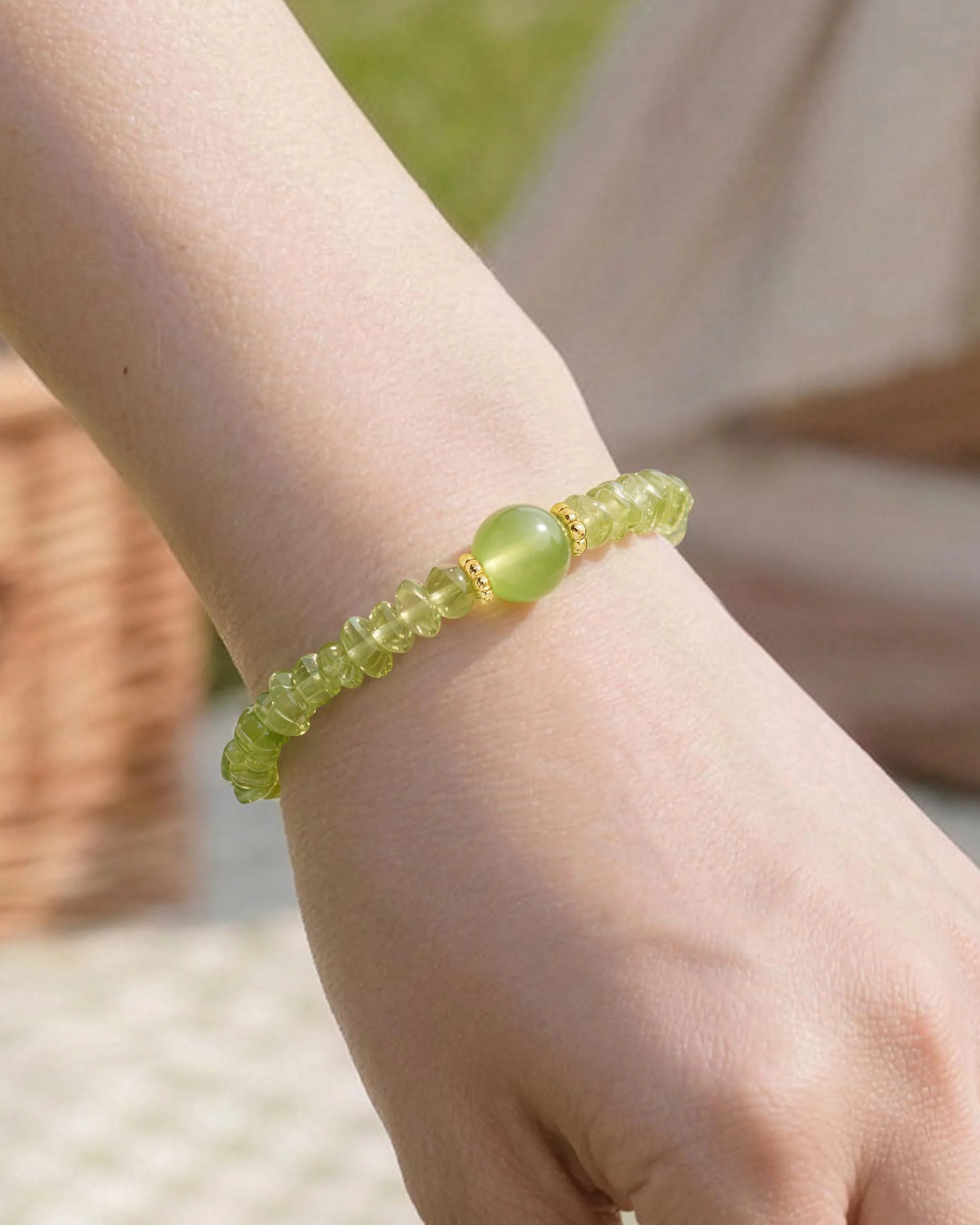 Close-up of Peridot Gold Freeform Chips Focal Bracelet on wrist