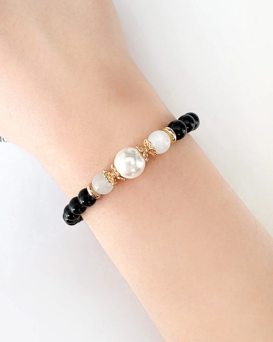 black onyx moonstone beaded gold plated bracelet on the model