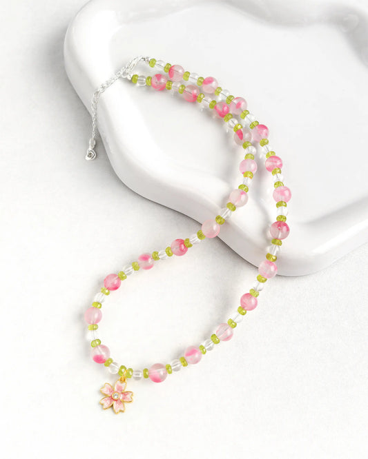 peridot rhodonite necklace with sakura pendant
